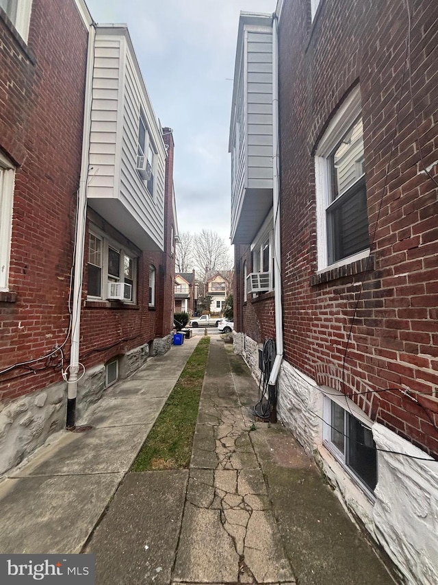 view of side of property featuring cooling unit