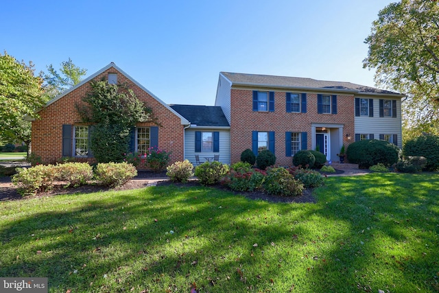 view of front of house with a front lawn