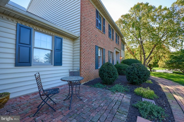 view of home's exterior featuring a patio