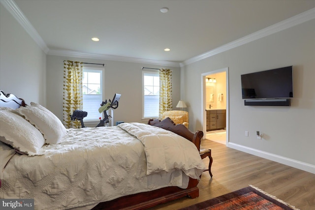 bedroom with ensuite bathroom, light wood-type flooring, and ornamental molding