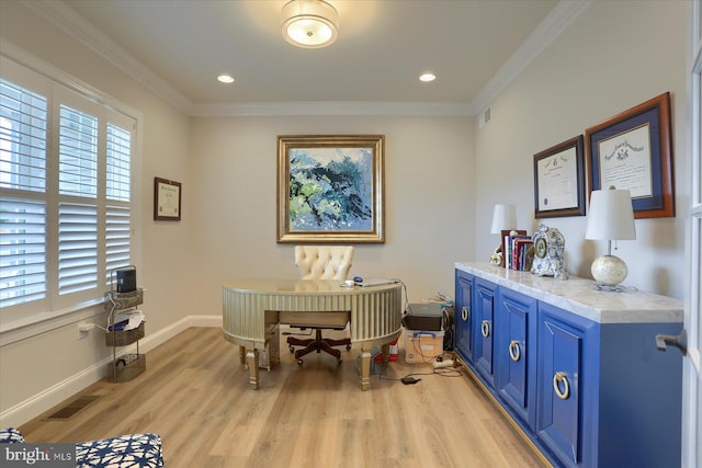 office featuring light hardwood / wood-style floors and crown molding