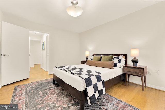 bedroom featuring hardwood / wood-style floors