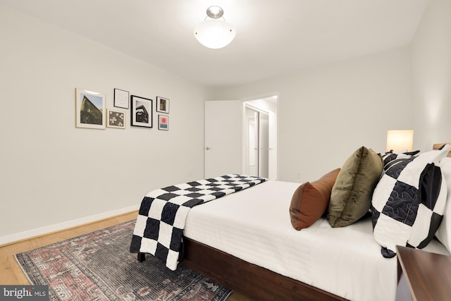 bedroom with wood-type flooring