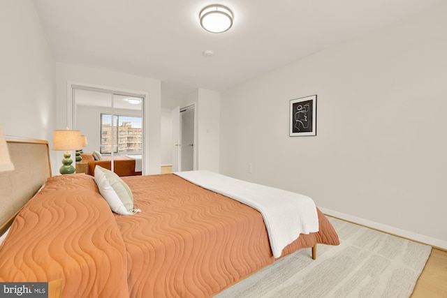 bedroom featuring light wood-type flooring