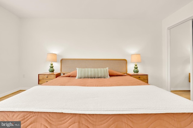 bedroom with light hardwood / wood-style floors