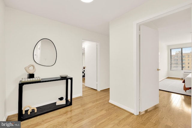 corridor featuring light hardwood / wood-style flooring