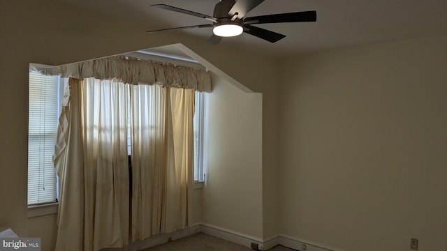 spare room with ceiling fan