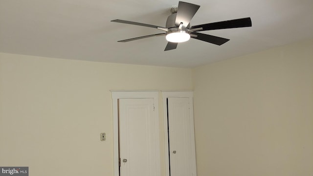 interior details featuring ceiling fan