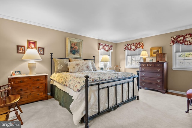 bedroom featuring light colored carpet and crown molding