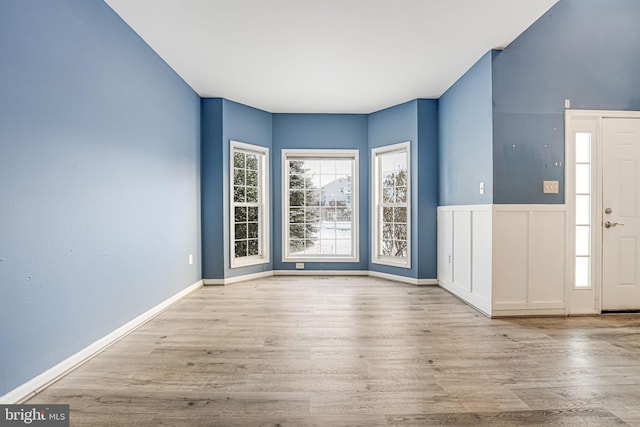 foyer with light hardwood / wood-style flooring