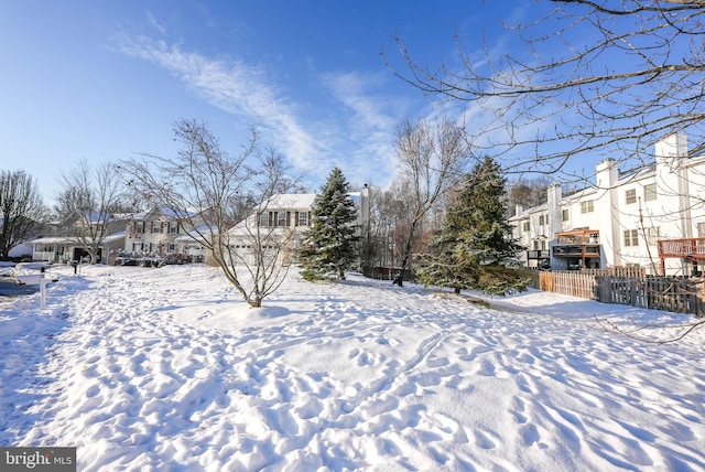 view of yard covered in snow