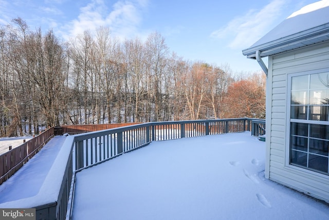 view of snow covered deck