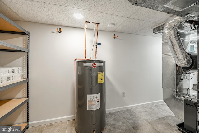 utility room with electric water heater