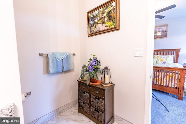 bathroom featuring ceiling fan