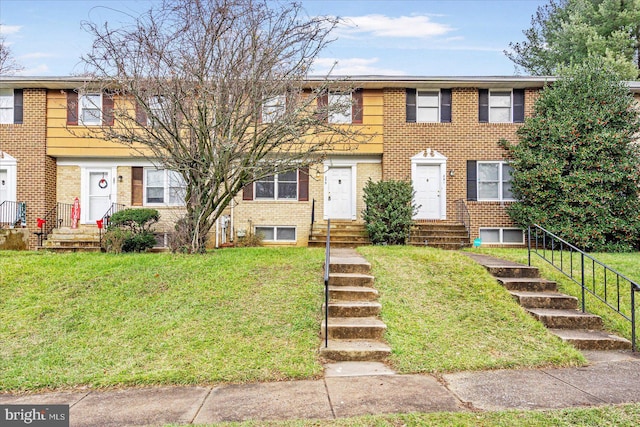 view of property with a front lawn