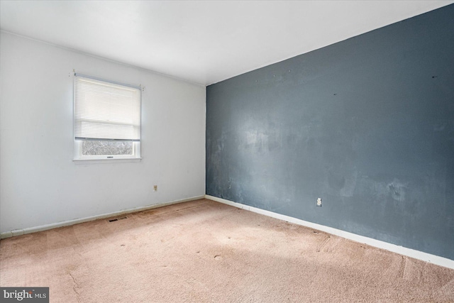 unfurnished room featuring carpet floors