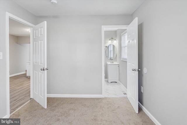 811 Rosedale Ave, Rosedale, MD 21237 - unfurnished bedroom with light colored carpet
