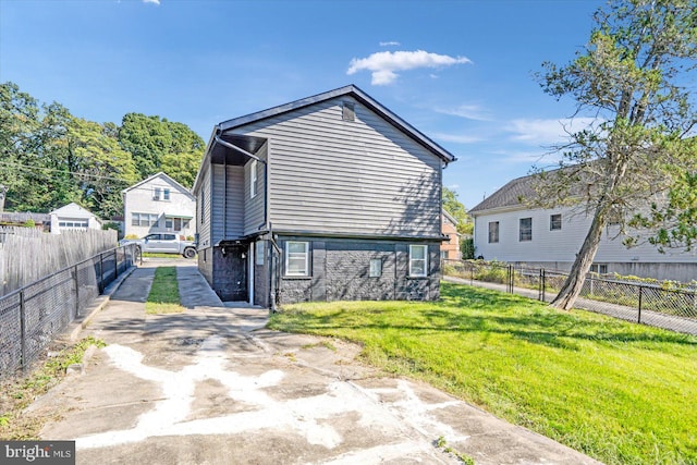 811 Rosedale Ave, Rosedale, MD 21237 - rear view of house with a yard