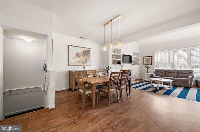 dining room featuring dark hardwood / wood-style floors