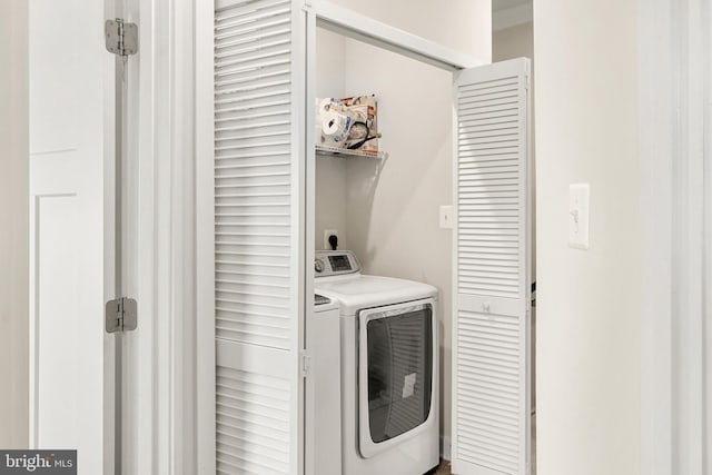 laundry area featuring independent washer and dryer