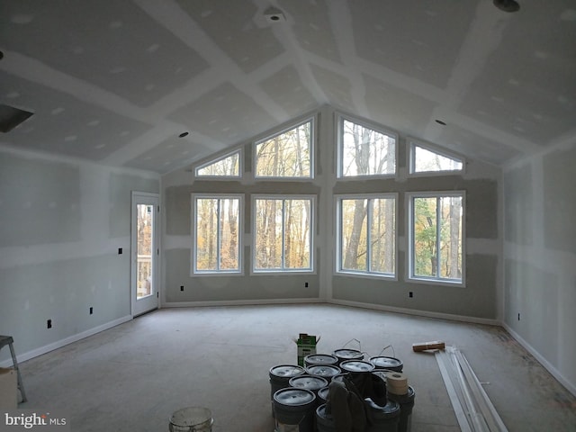 interior space with plenty of natural light and lofted ceiling