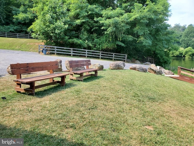 view of yard with a water view