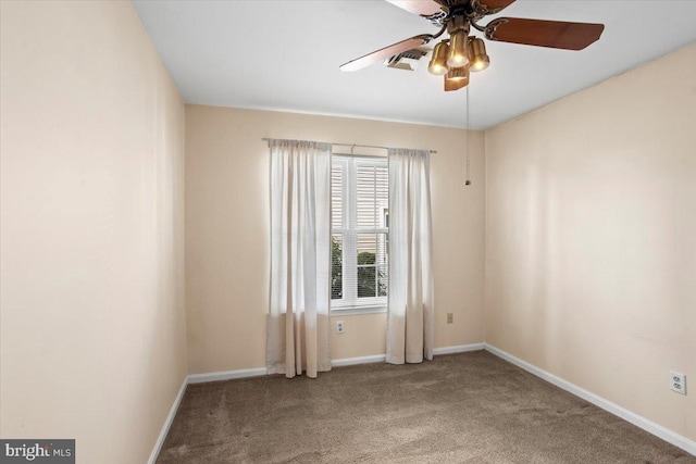 empty room featuring light carpet and ceiling fan