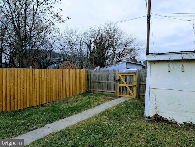 view of yard with a gate and fence