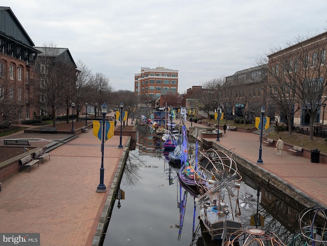 view of community with a dock