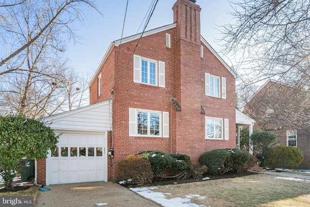 view of side of property with a garage