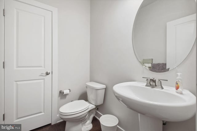 bathroom featuring sink and toilet