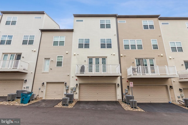 back of property with central AC unit