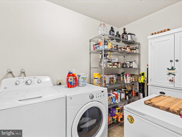 laundry area featuring washer and clothes dryer