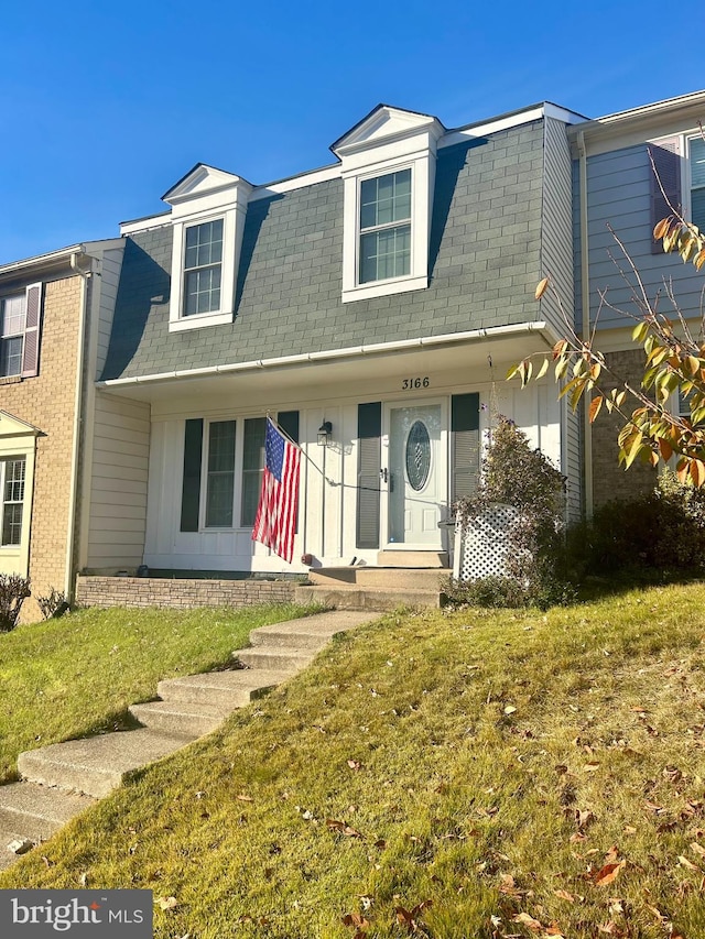 view of front of home with a front yard