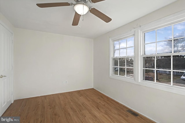 spare room featuring hardwood / wood-style flooring