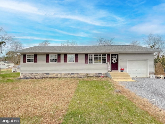 ranch-style house with a front lawn and a garage