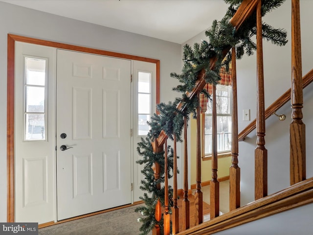 foyer entrance with plenty of natural light