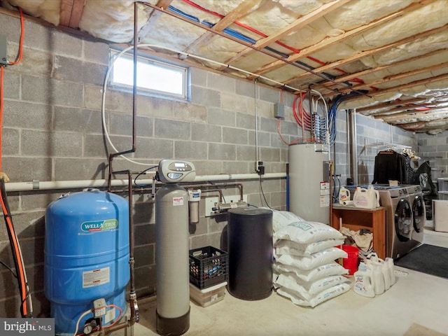 utility room featuring washer and clothes dryer and electric water heater