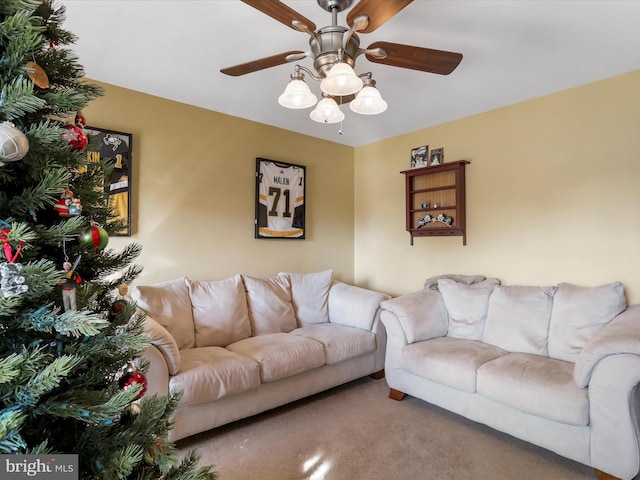 living room with carpet and ceiling fan