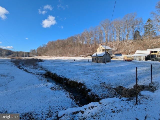 view of yard covered in snow