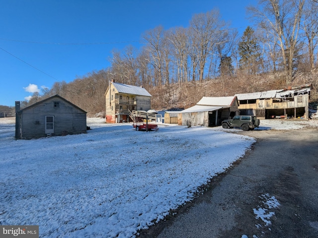 exterior space with an outbuilding