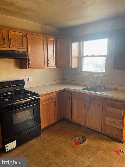 kitchen with gas stove and sink