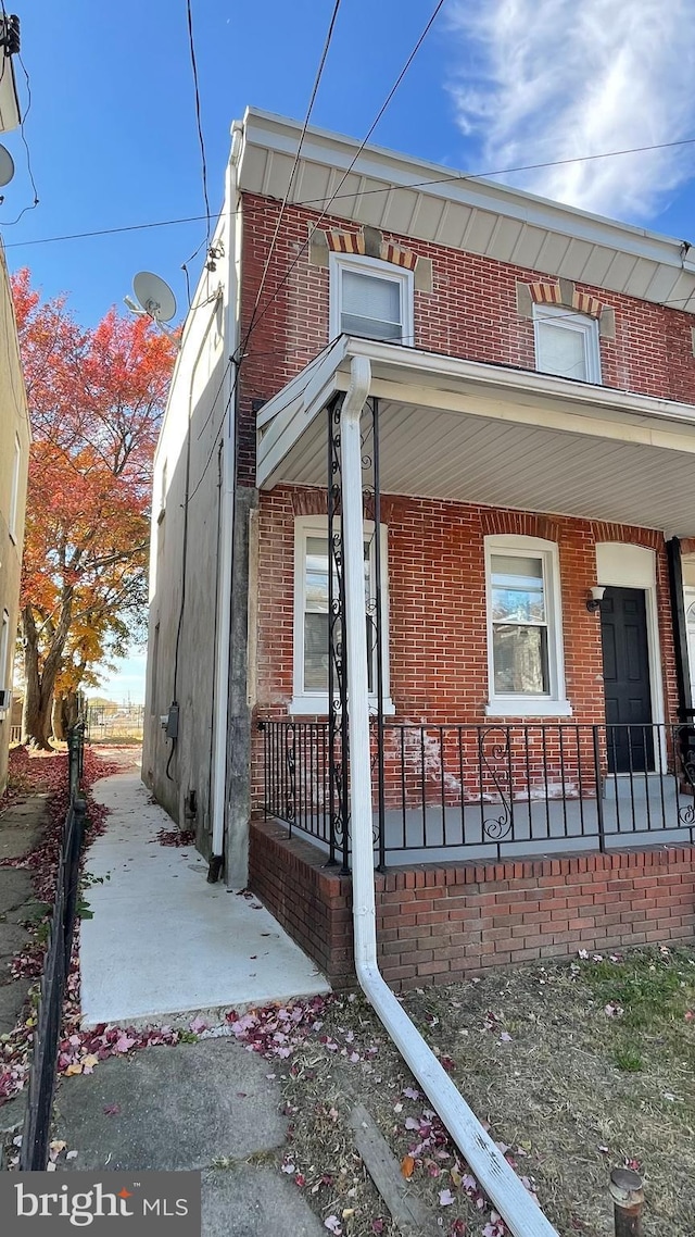 view of home's exterior featuring covered porch