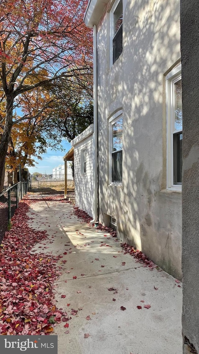 view of home's exterior with a patio area