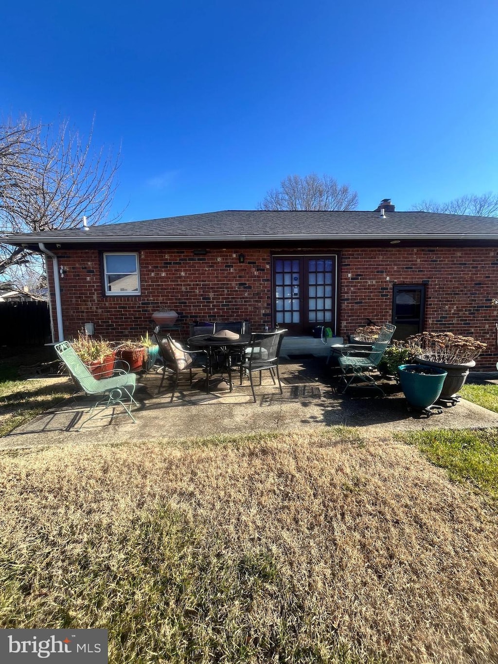 rear view of house featuring a patio area