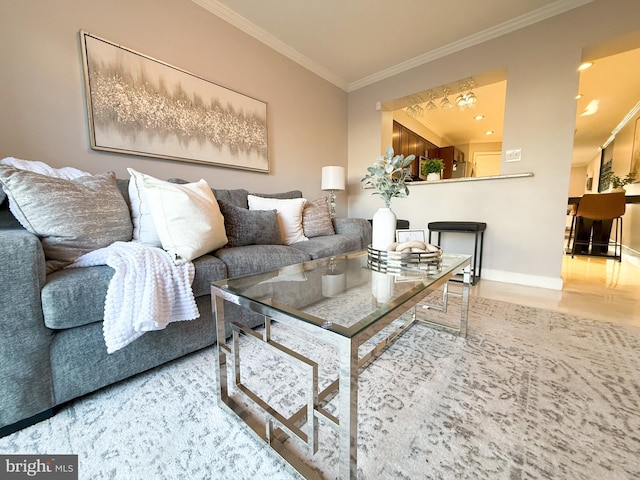 living room featuring crown molding