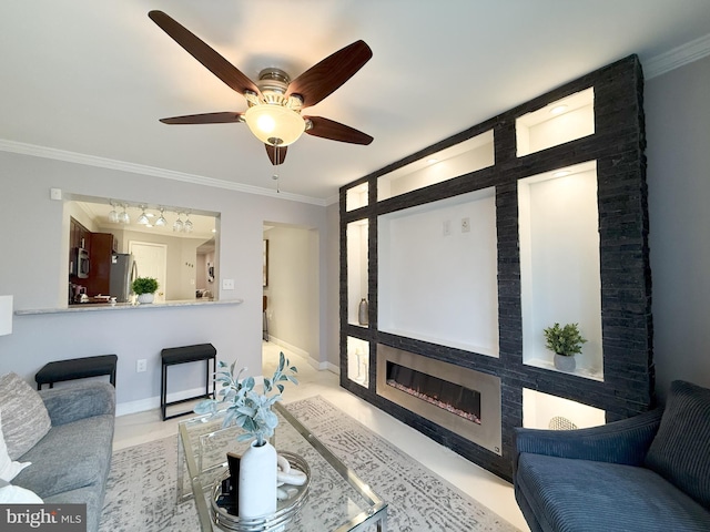 living room featuring ceiling fan and ornamental molding