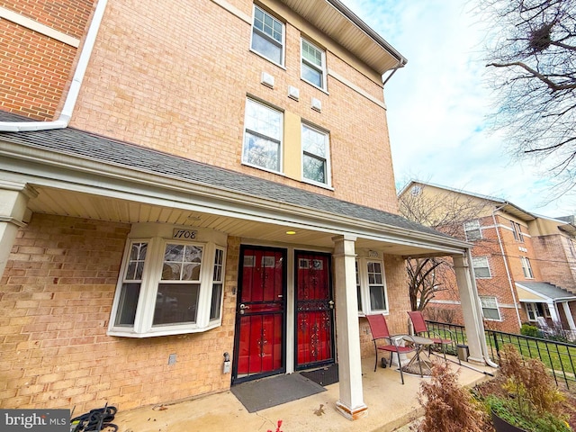 entrance to property with covered porch