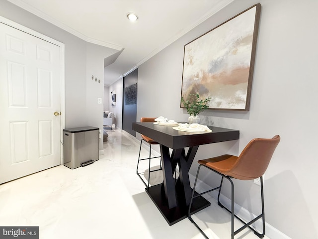 dining room with ornamental molding