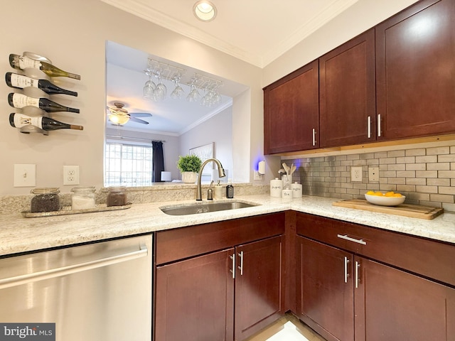 kitchen featuring decorative backsplash, light stone countertops, stainless steel dishwasher, crown molding, and sink